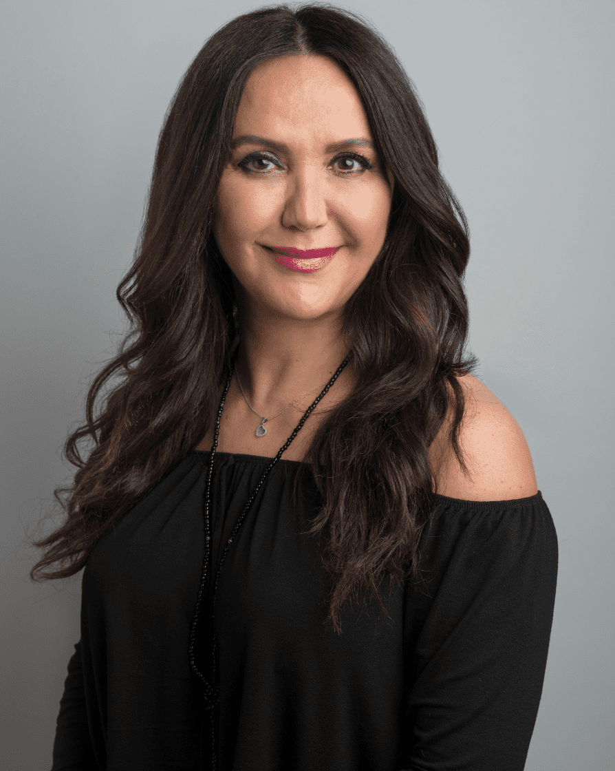 Julia — Stylist at Warren Tricomi. Specializes in stylist